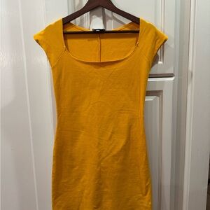 Gil Rodriguez el Tigre mini dress in orange blouse